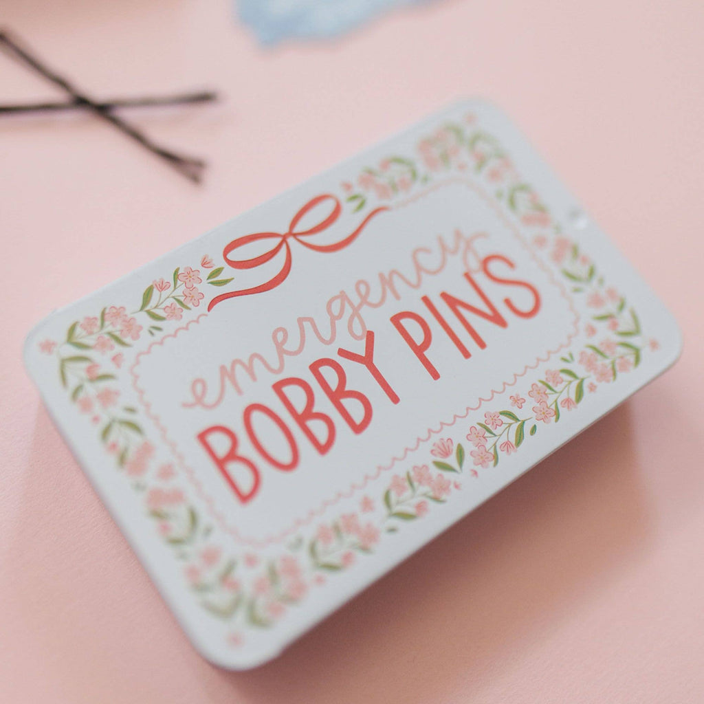 Card with 'Emergency Bobby Pins' text on a pink background