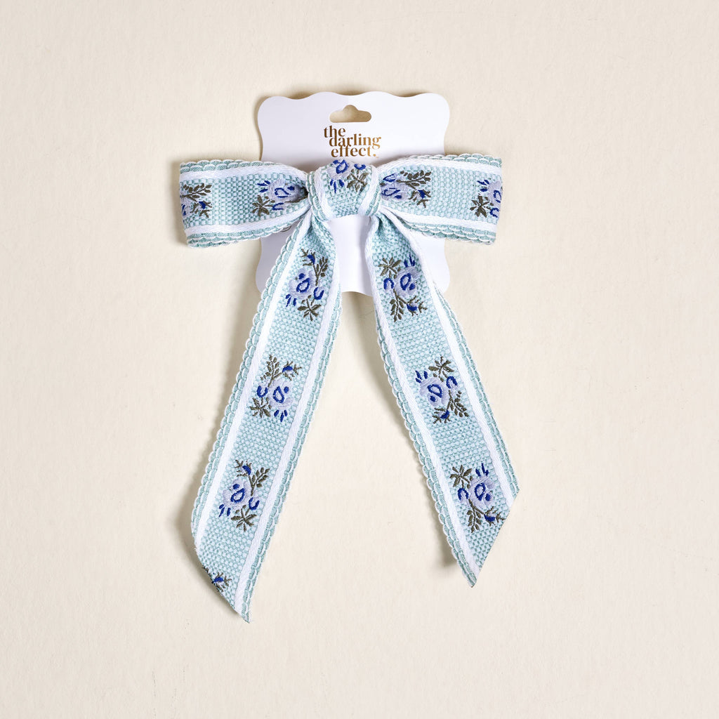 Decorative ribbon with floral pattern on a beige background