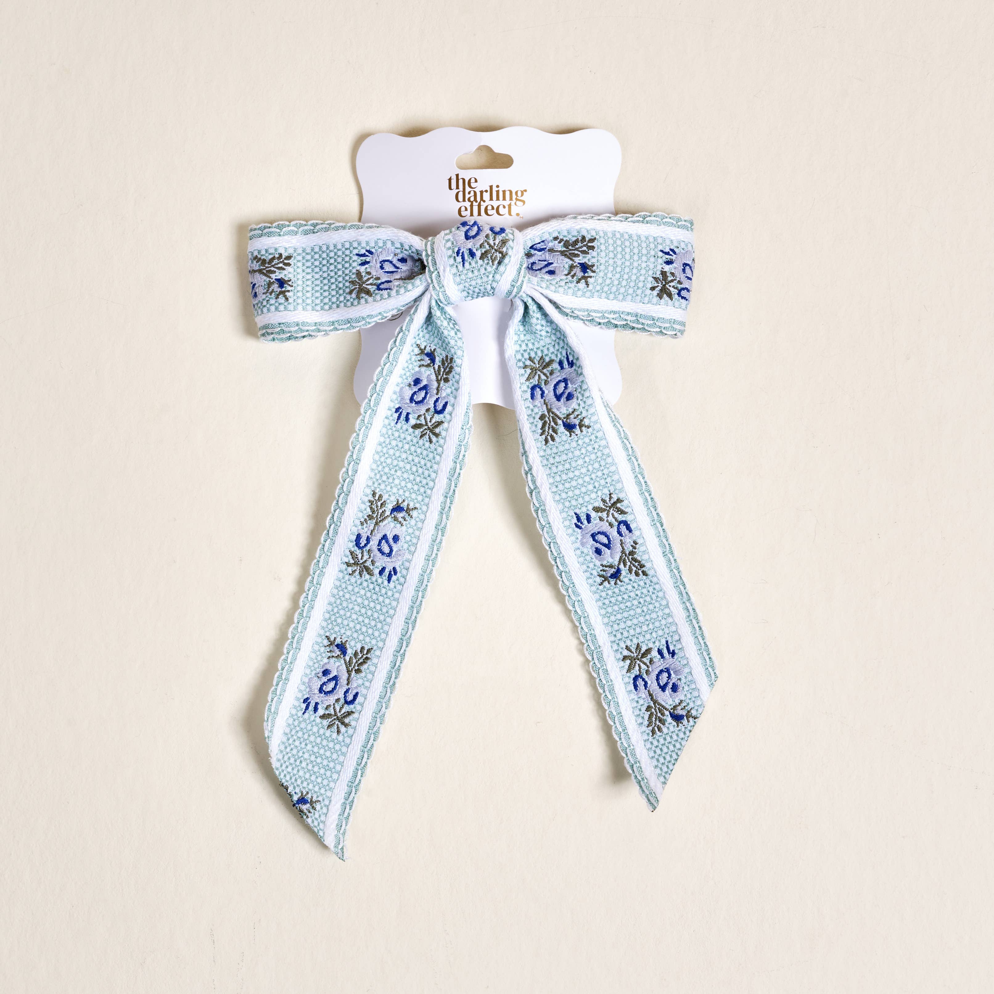 Decorative ribbon with floral pattern on a beige background