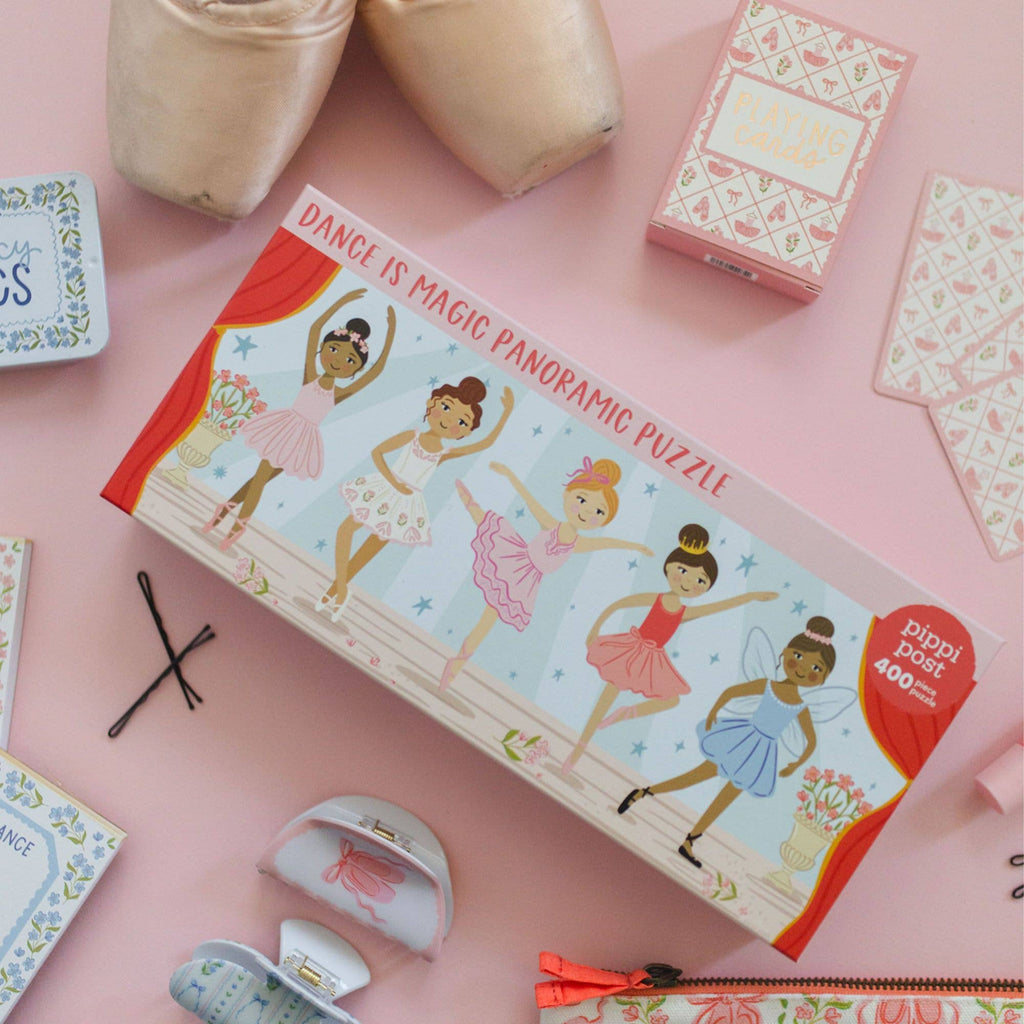 Dance-themed puzzle box with ballerina illustrations on a pink background