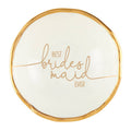 Round white coaster with gold text 'Best Bridesmaid Ever' on a white background