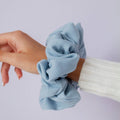 Powder Blue Jumbo Scrunchie made from soft oversized fabric.