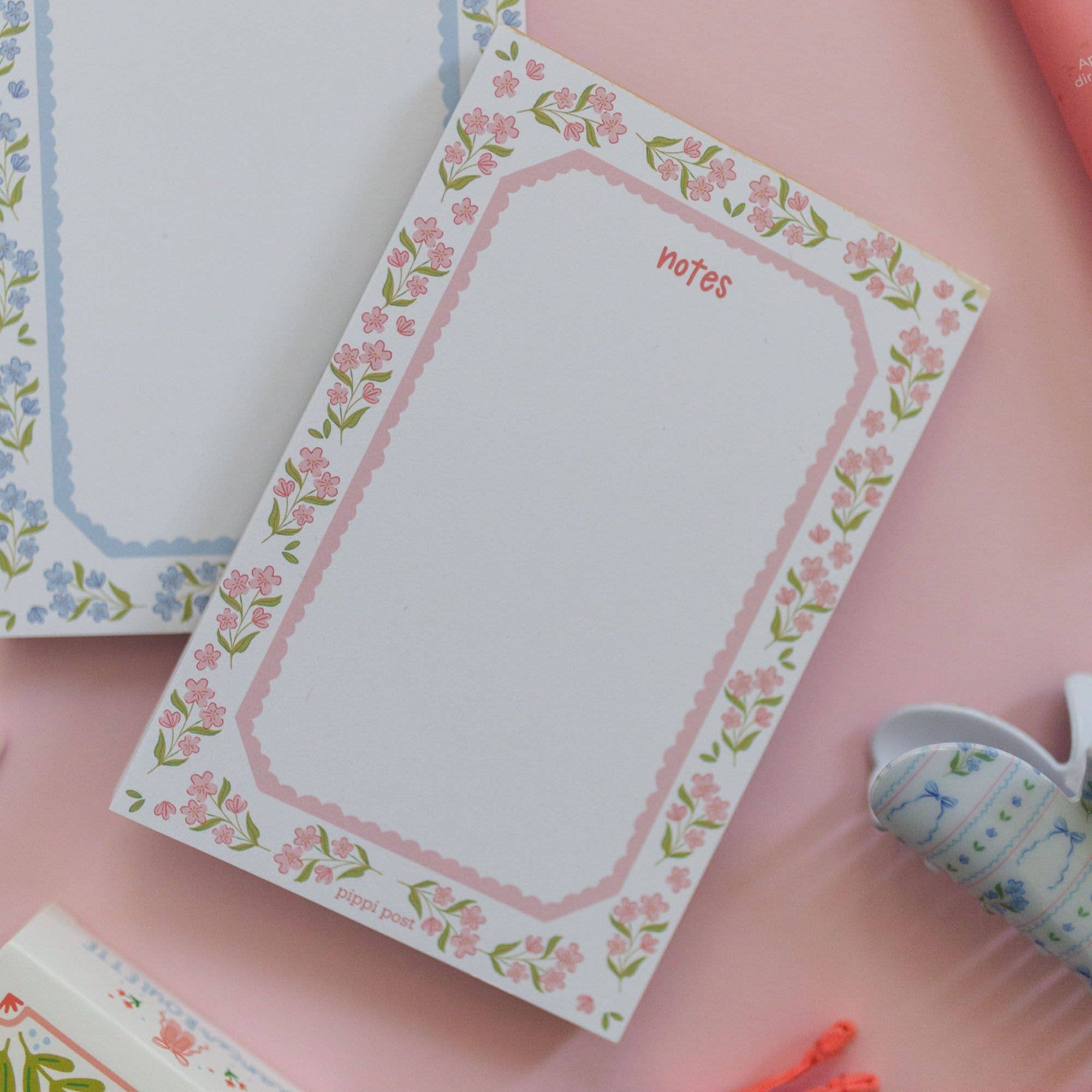 Pink floral 4x6 notepad with hand-illustrated floral border and notes header for everyday lists and reminders.