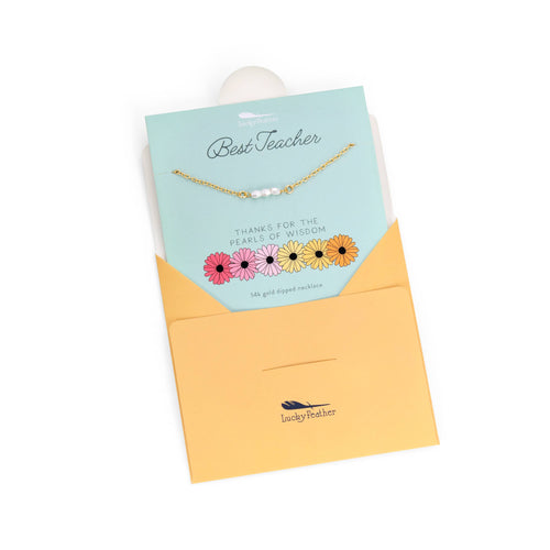 Necklace with a card labeled 'Best Teacher' on a white background