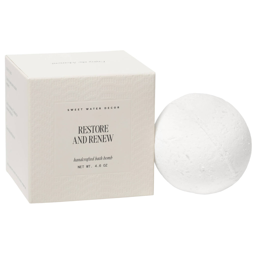 White bath bomb with packaging labeled 'Restore and Renew' on a white background