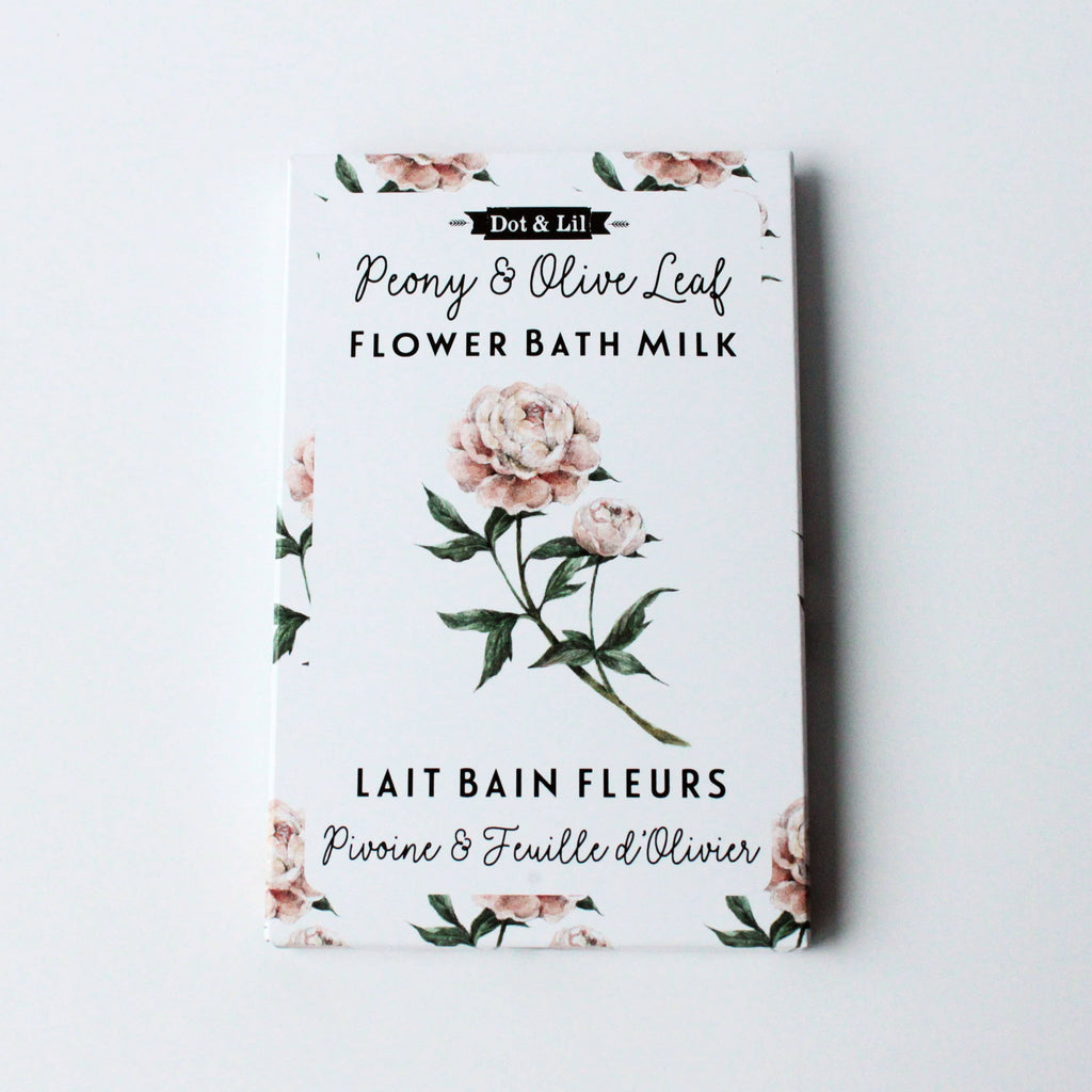 Packaging of Dot & Lil Peony & Olive Leaf Flower Bath Milk on a light gray background