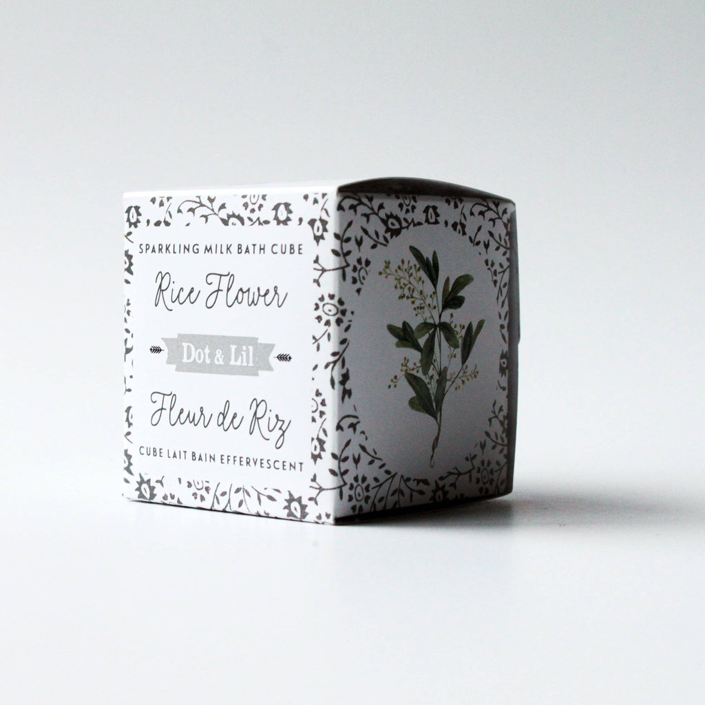 Box of Dot & Lil sparkling milk bath cube with floral design on a white background