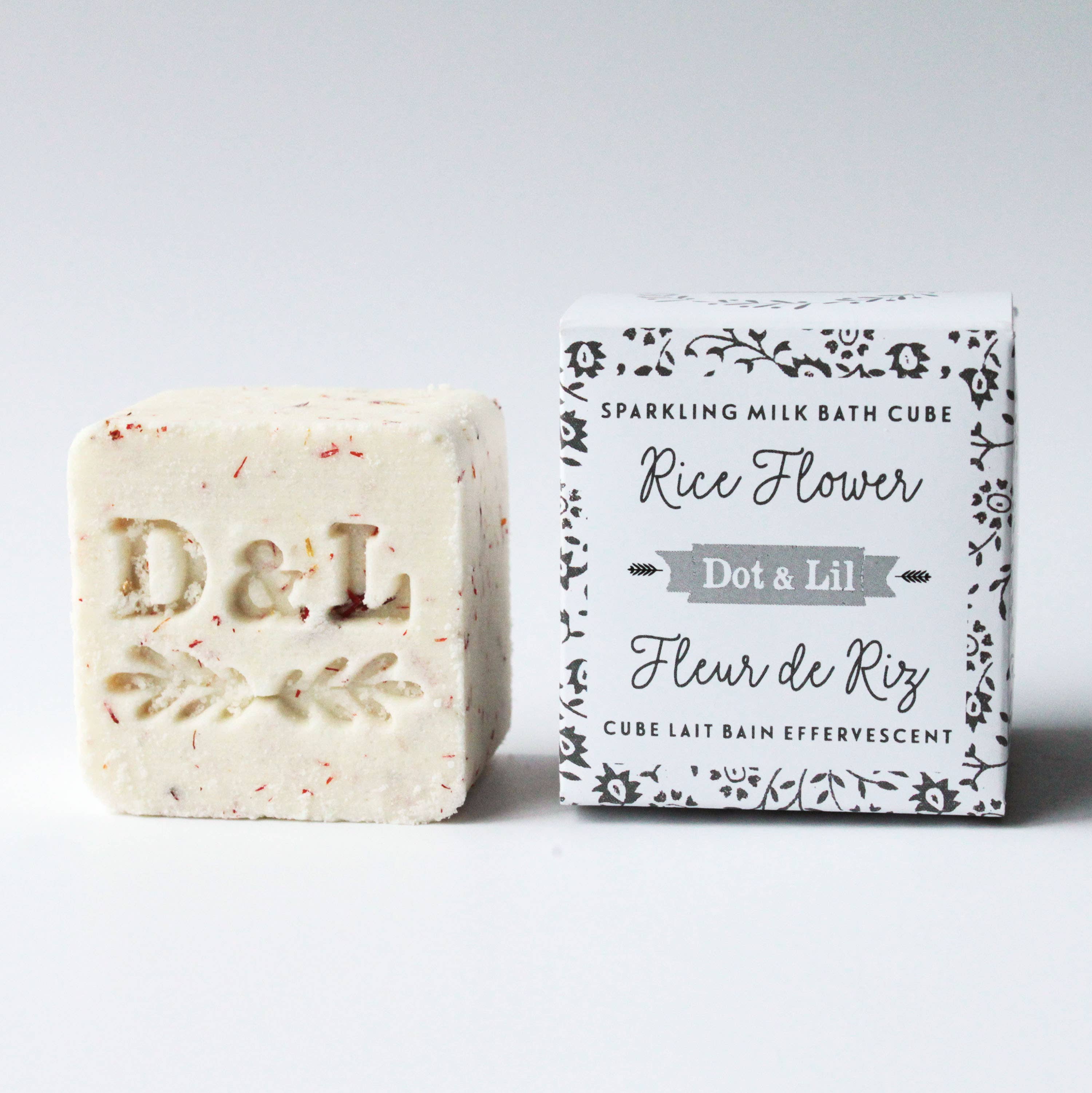 Bath cube and packaging with 'Dot & Lil' branding on a white background