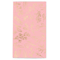 Pink paper with gold floral patterns on a white background