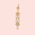 Gold pendant with clear stones on a pink background
