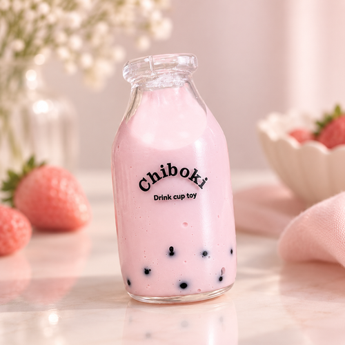 Chiboki Studio Strawberry Bubble Tea Squishy with pink milk tea and boba details styled against a soft blush background with strawberries.