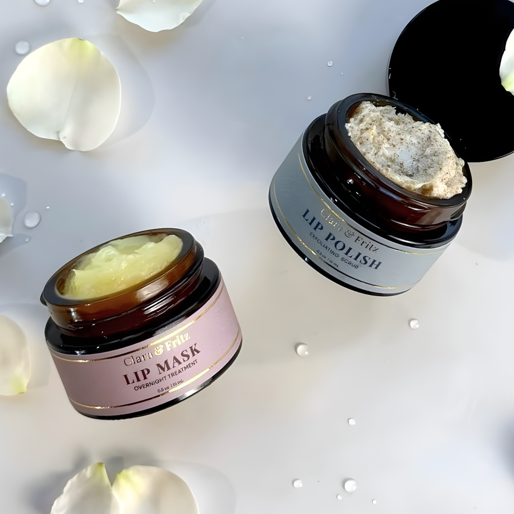 Two lip care products, 'Lip Mask' and 'Lip Polish', on a light background with white petals.