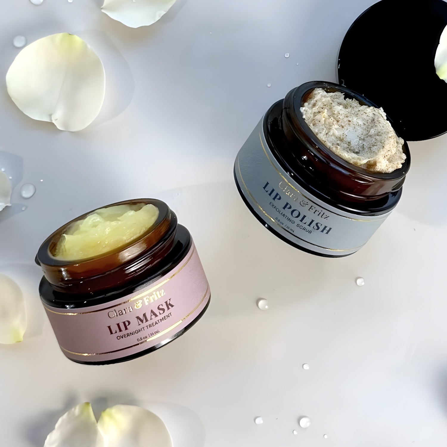 Two lip care products, 'Lip Mask' and 'Lip Polish', on a light background with white petals.