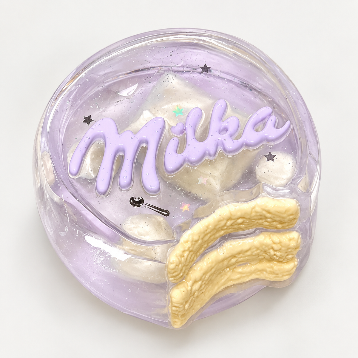 Taro White Chocolate TABA Squishy toy with translucent lavender coloring, pastel lettering, tiny star accents and creamy white chocolate-inspired details.
