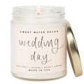 Candle in a jar with 'Sweet Water Decor' branding and 'wedding day' label on a white background