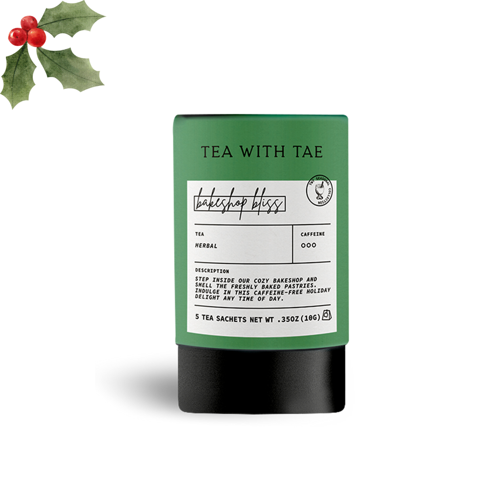 Tea packaging with a label and holly leaves on a white background