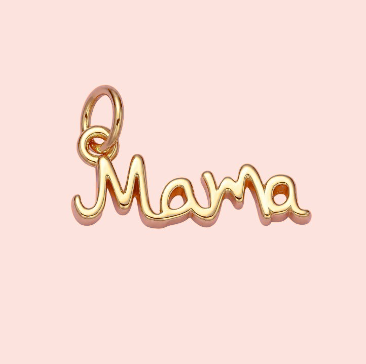 Gold 'Mama' pendant on a pink background