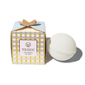 Bath balm next to its packaging with 'musee' branding on a white background