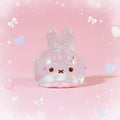 Clear Bunny Taba Squishy slow-rising sensory fidget toy with sparkling glitter gel on a blush pink background.