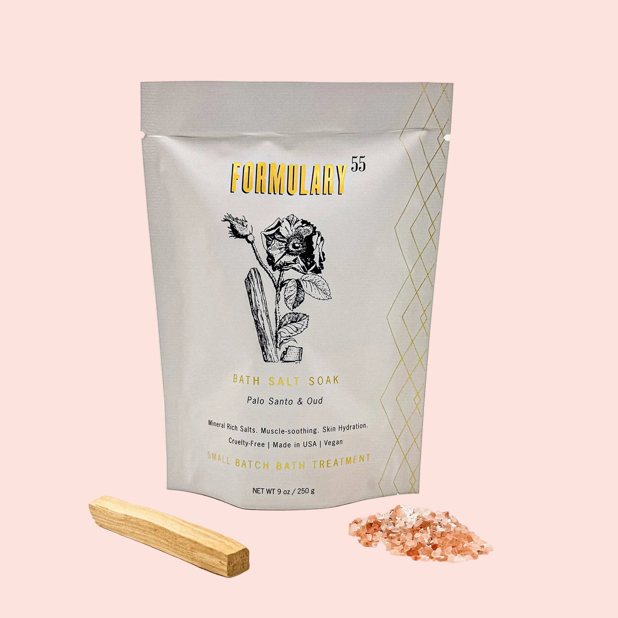 Formulary 55 bath salt soak packaging with a wooden stick and bath salts on a white background