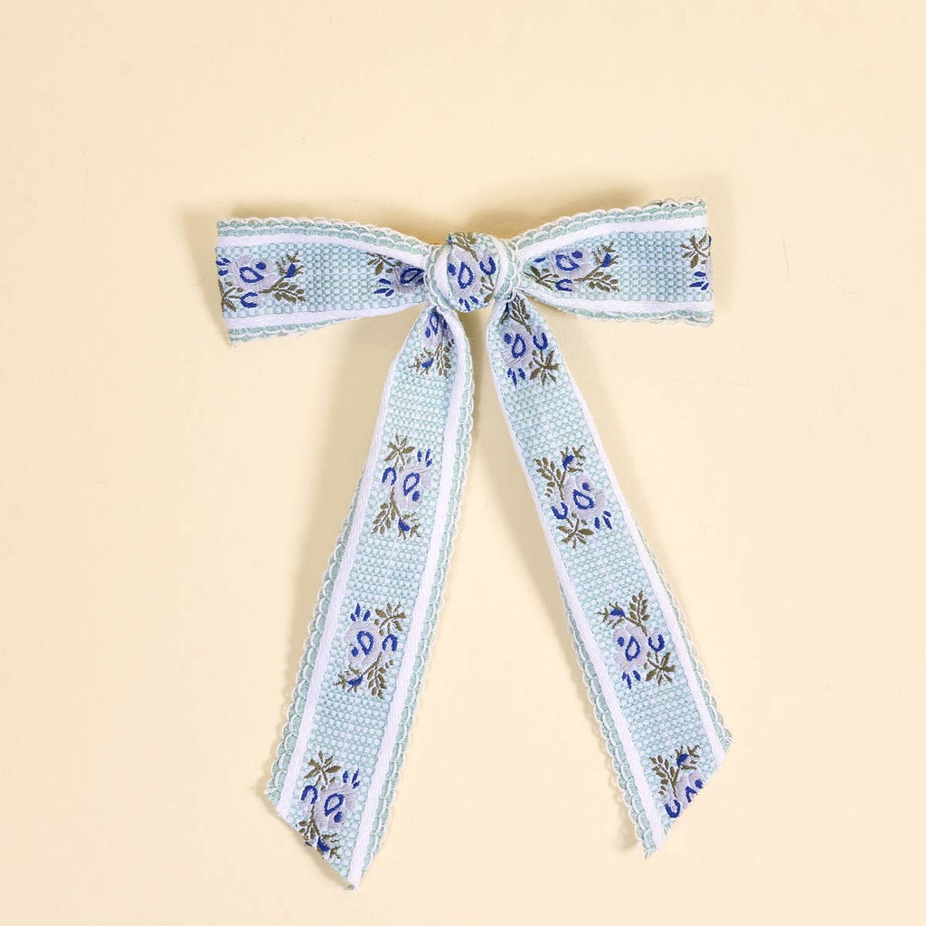 Decorative ribbon with floral pattern on a beige background