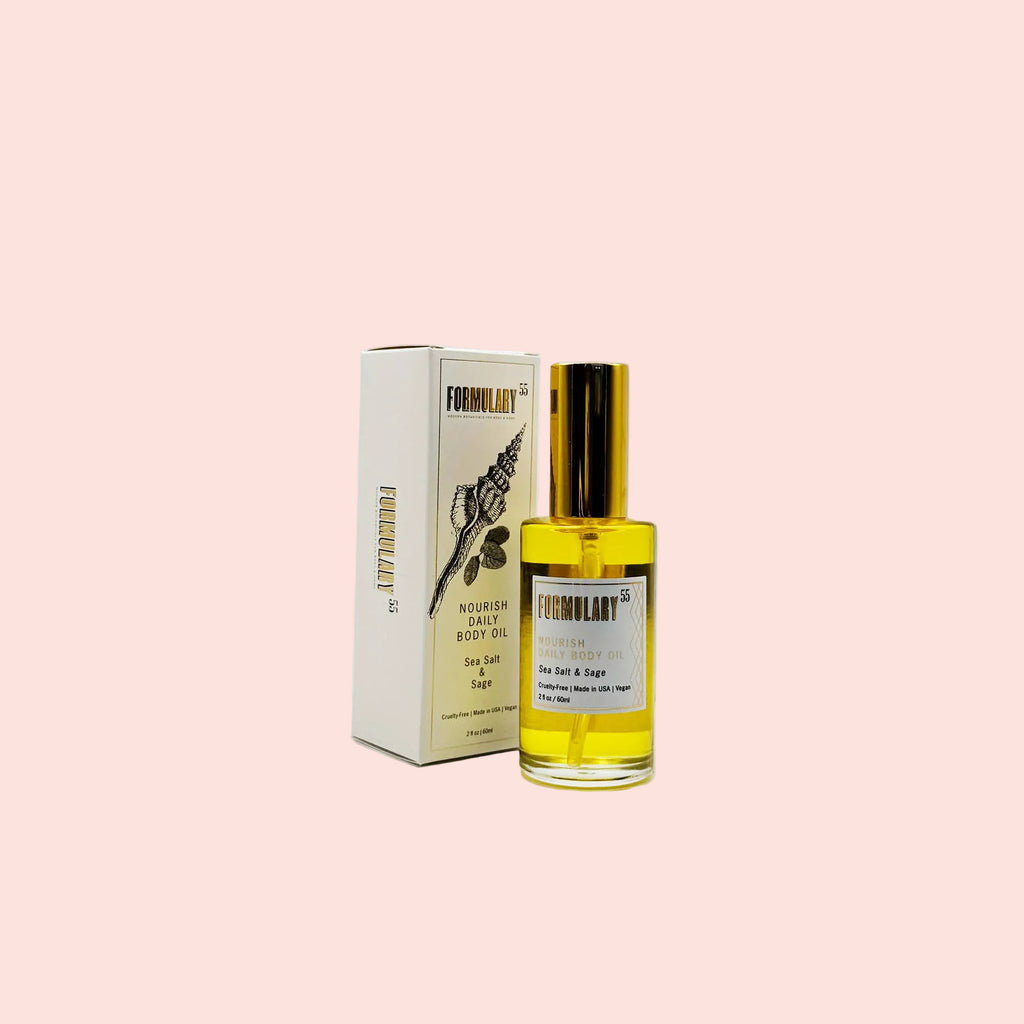 Bottle and box of Formulary 55 nourishing body oil on a white background