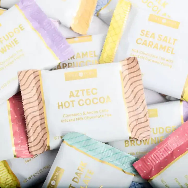 Assorted chocolate bars with visible branding and flavors.