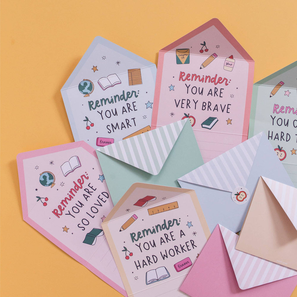 Collection of motivational cards with messages on a yellow background
