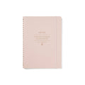 Blush faux leather Signature Edition spiral notebook with gold foil lettering, elastic band closure, and gold spiral binding. A beautiful lined journal for planning, journaling, work notes, and everyday inspiration.