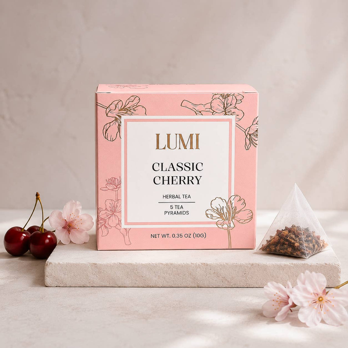 Lumi Classic Cherry herbal tea packaging with cherry and flower decorations on a light background