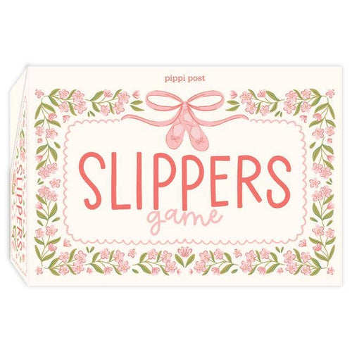 The product packaging for 'Slippers Game' by Pippi Post, featuring a cream-colored box decorated with pink floral borders, green leaves, and pink ballet slippers with a bow at the top.