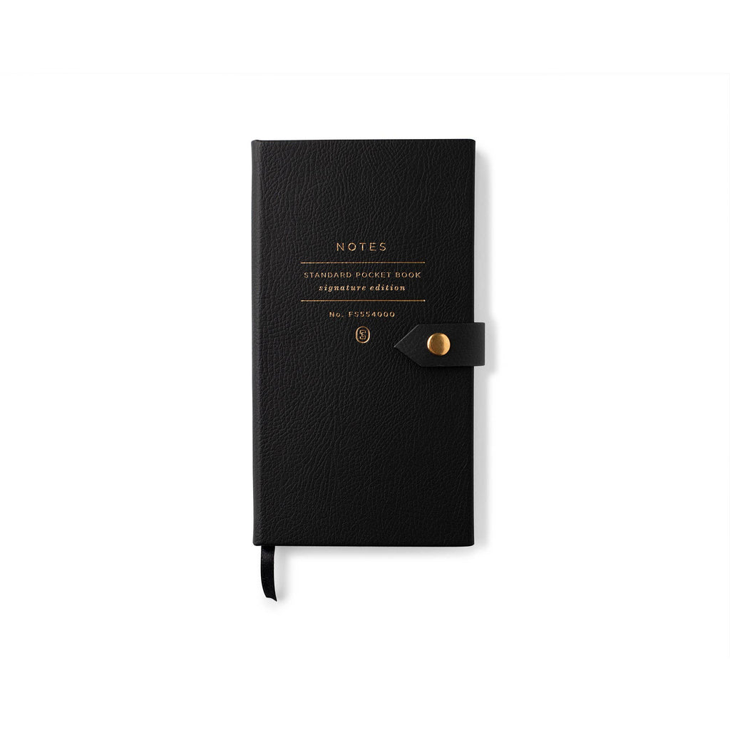 Black faux leather Signature Edition pocket notebook with gold foil lettering, snap button closure, and ribbon bookmark. A compact notebook for journaling, work notes, travel, and everyday organization.