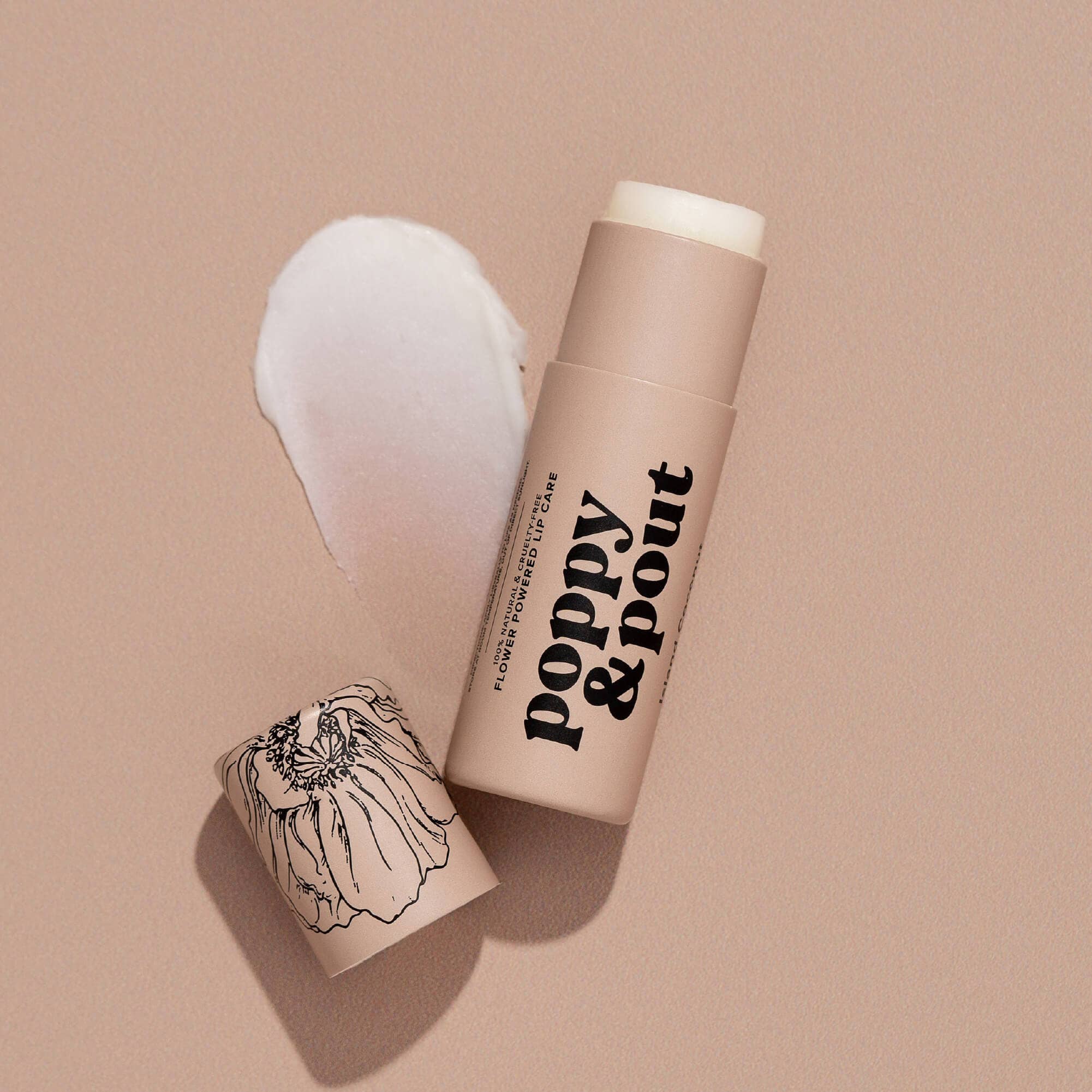 Cosmetic product with applicator on a beige background, featuring 'Poppy & Pout' branding.
