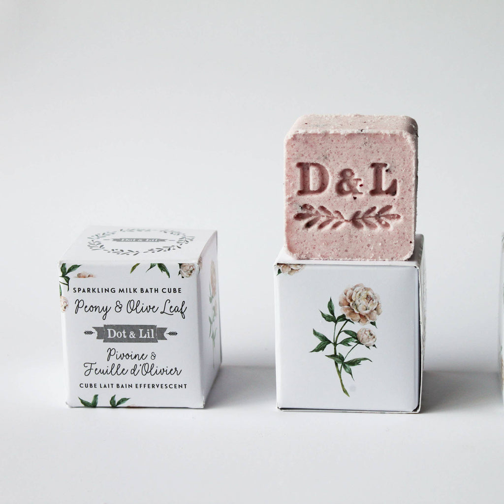 Three boxes of 'Pome & Olive Leaf' bath cures with a bar of soap on a white background