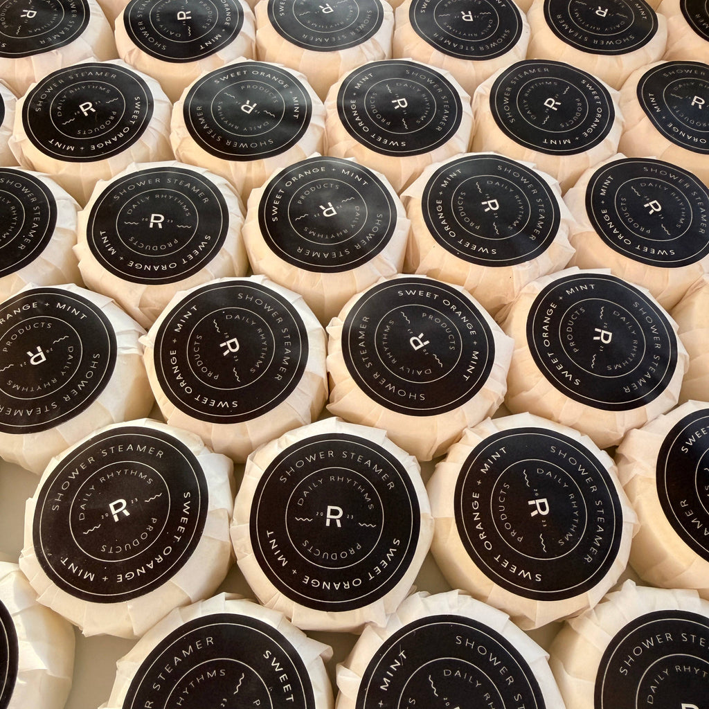 Close-up of wrapped products with a brand logo on a grid pattern