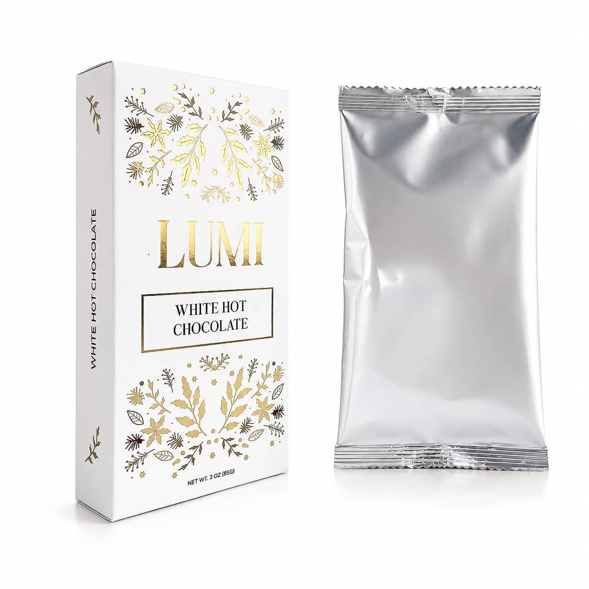 A white rectangular box of LUMI White Hot Chocolate with gold botanical illustrations and a silver foil packet standing beside it on a clean white background.