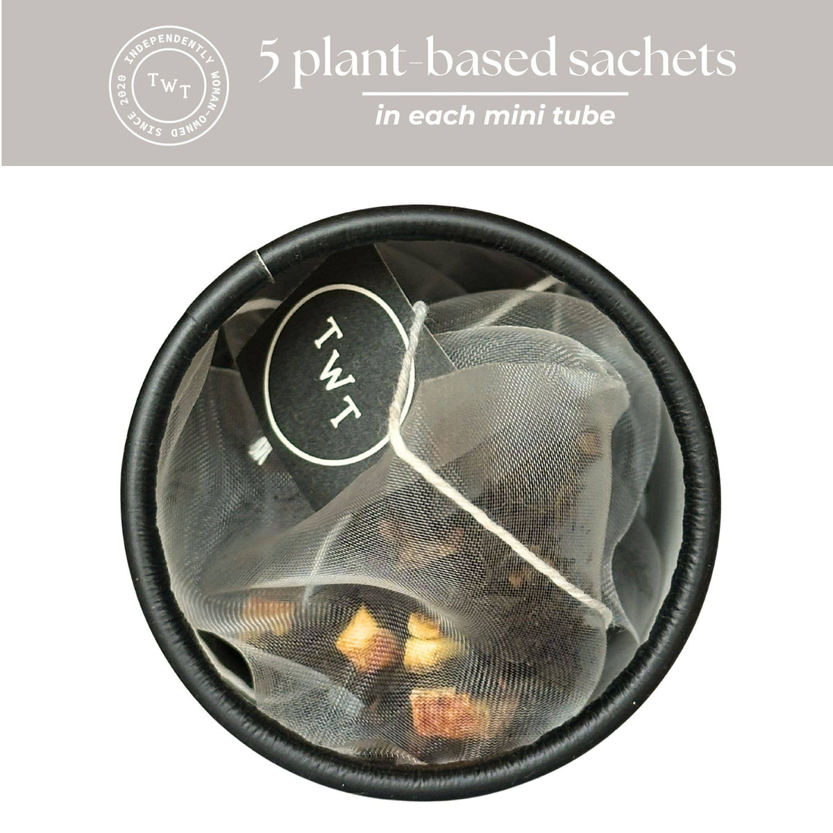Tea bag with plant-based sachets in a black container, featuring the brand 'TWT'.