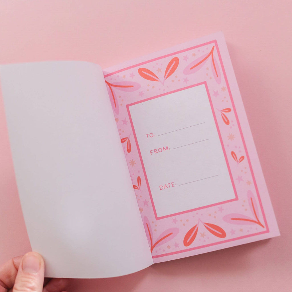 Pink gift tag with 'To', 'From', and 'Date' fields on a pink background