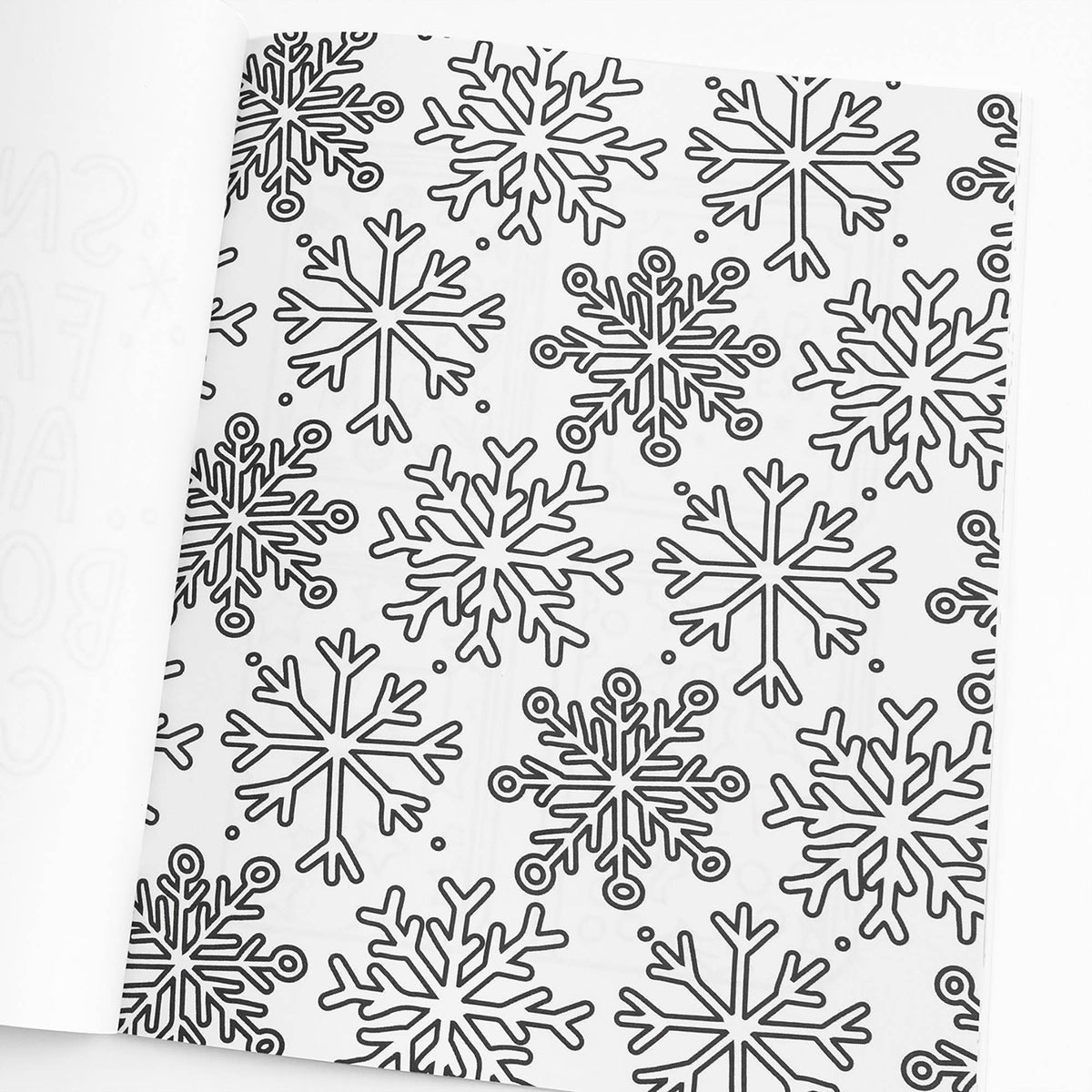 Pattern of black snowflakes on a white background