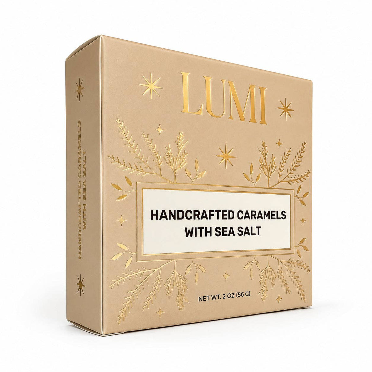 A square kraft paper box for Lumi Handcrafted Caramels with Sea Salt, decorated with gold foil botanical illustrations and the brand name 'LUMI' in gold. The front features a white label with black text.