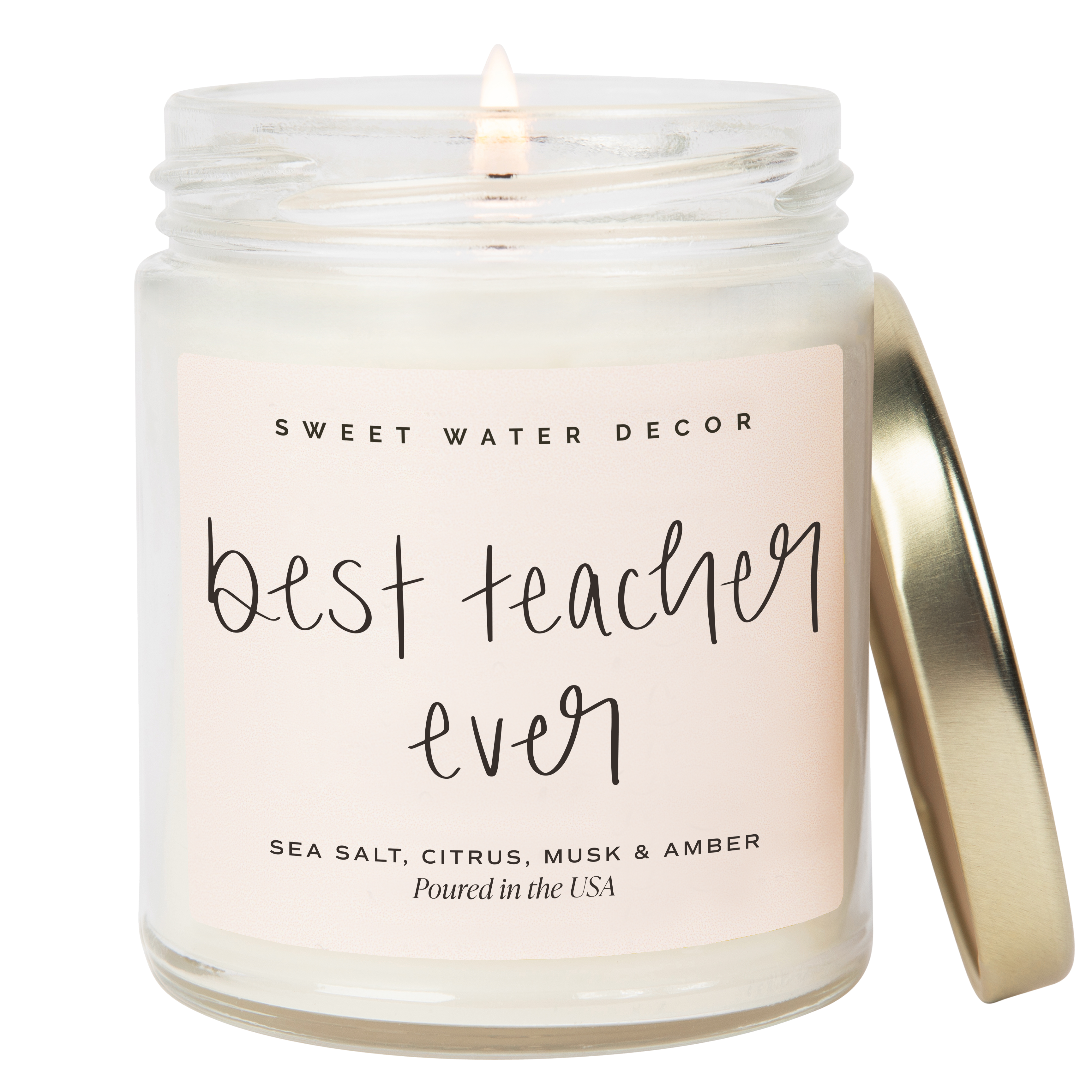 Candle in a jar with 'best teacher ever' text on the label, by Sweet Water Decor.