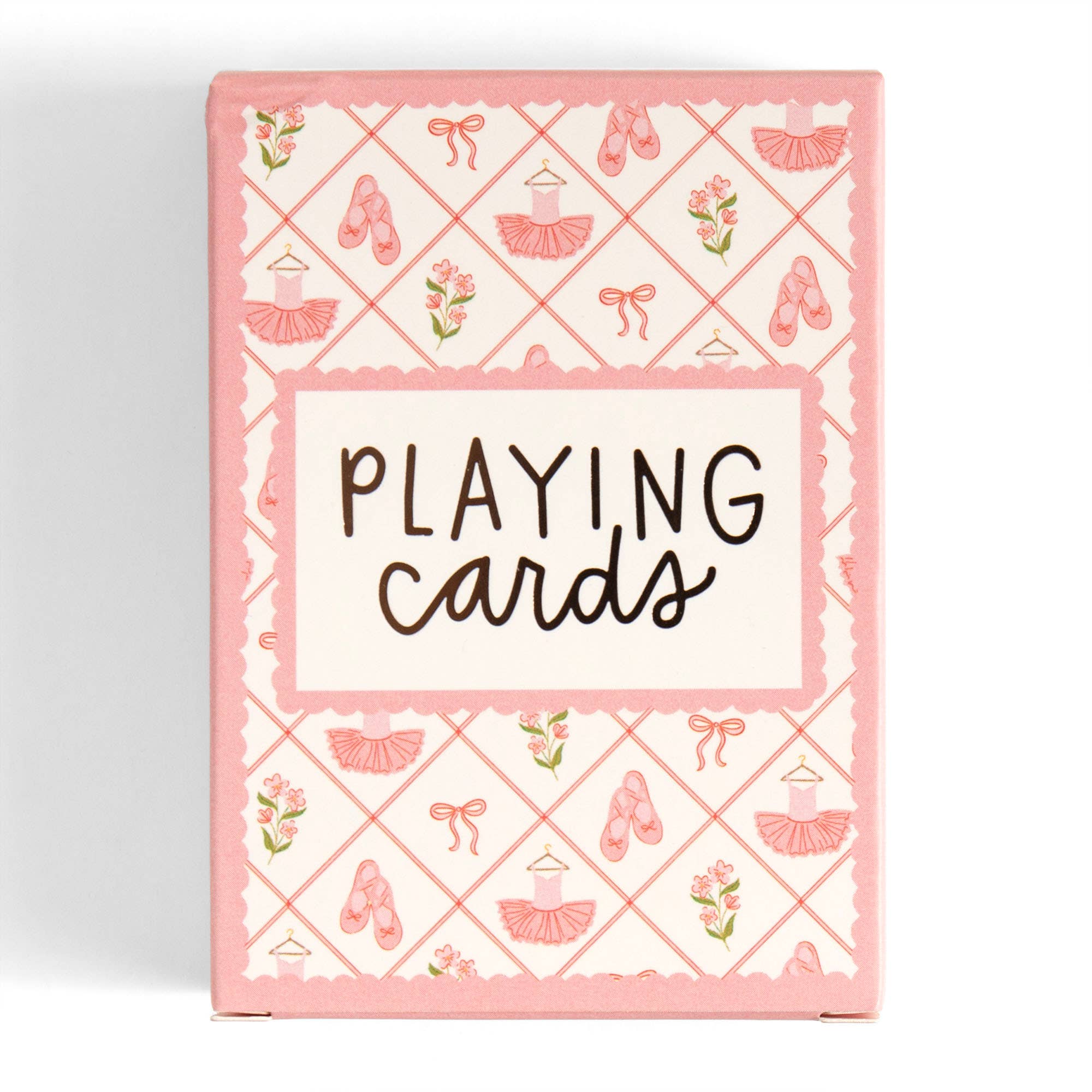 A pink and white box of playing cards decorated with ballet dancer motifs, including tutus, pointe shoes, bows, and flowers, with the text 'PLAYING cards' in the center.