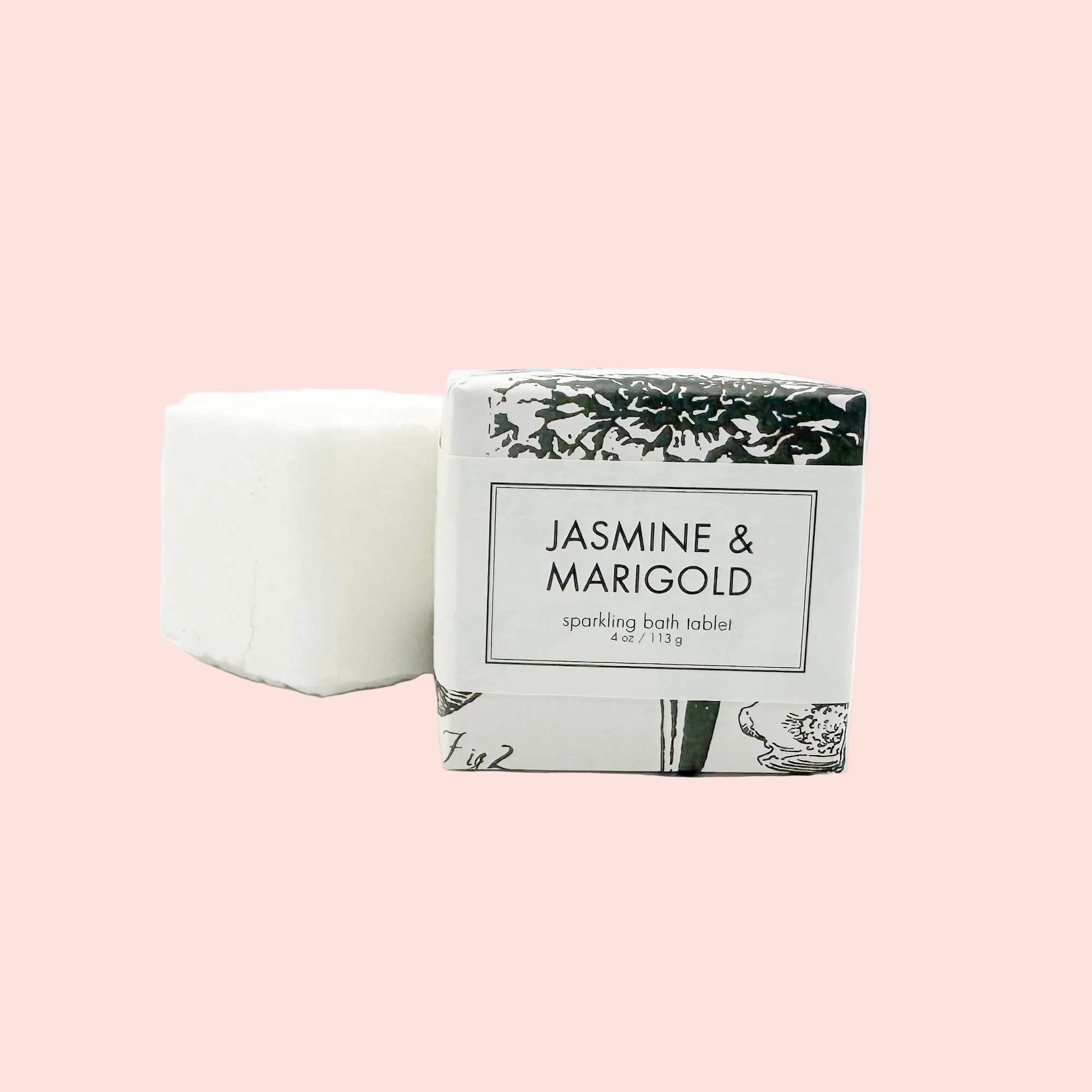 Bar of soap with a packaging box labeled 'Jasmine & Marigold' on a white background