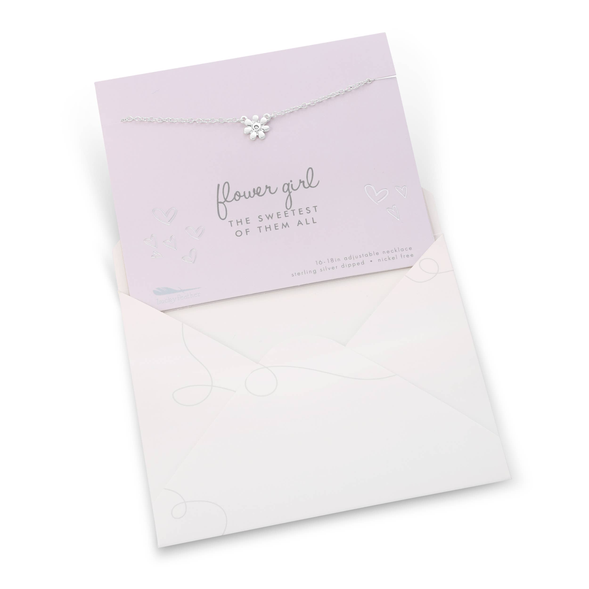 Necklace with a card labeled 'flower girl' on a white background