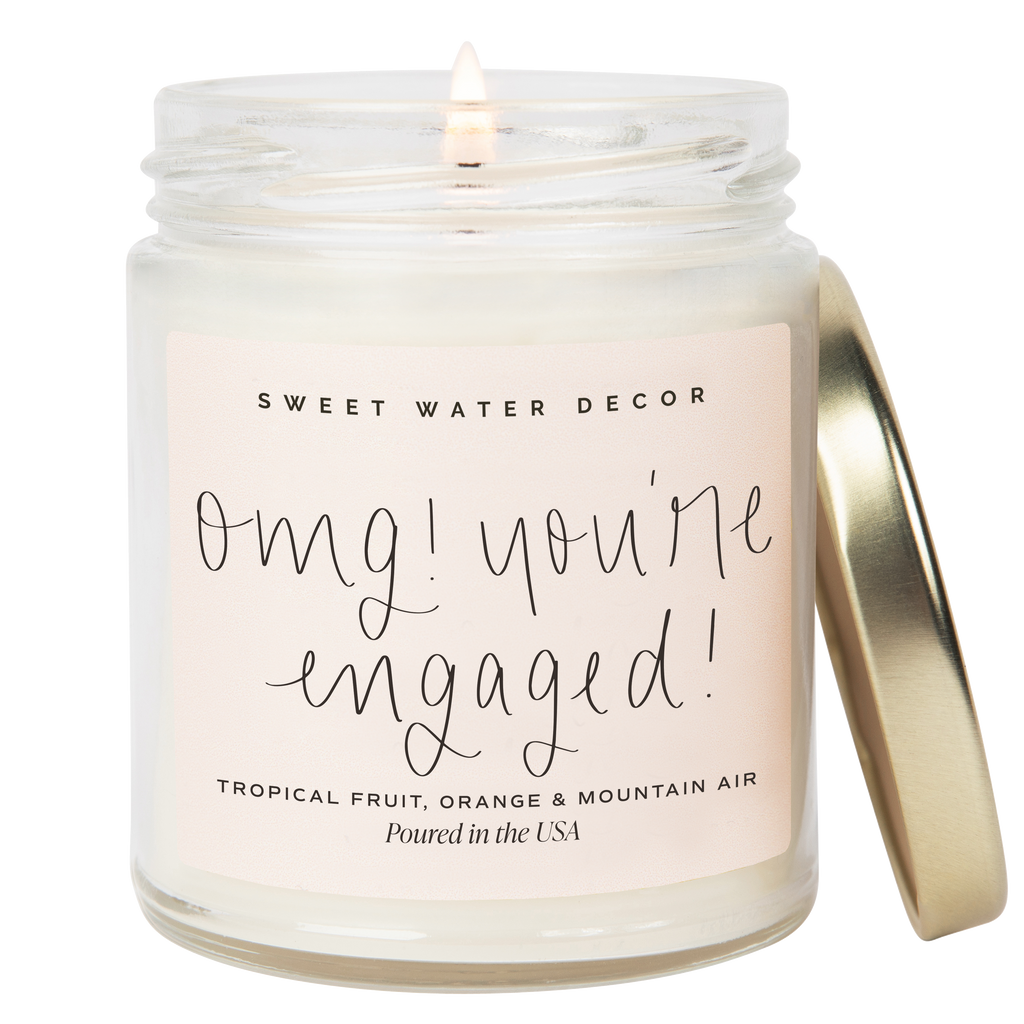 Candle in a jar with 'Sweet Water Decor' branding and text on a white background