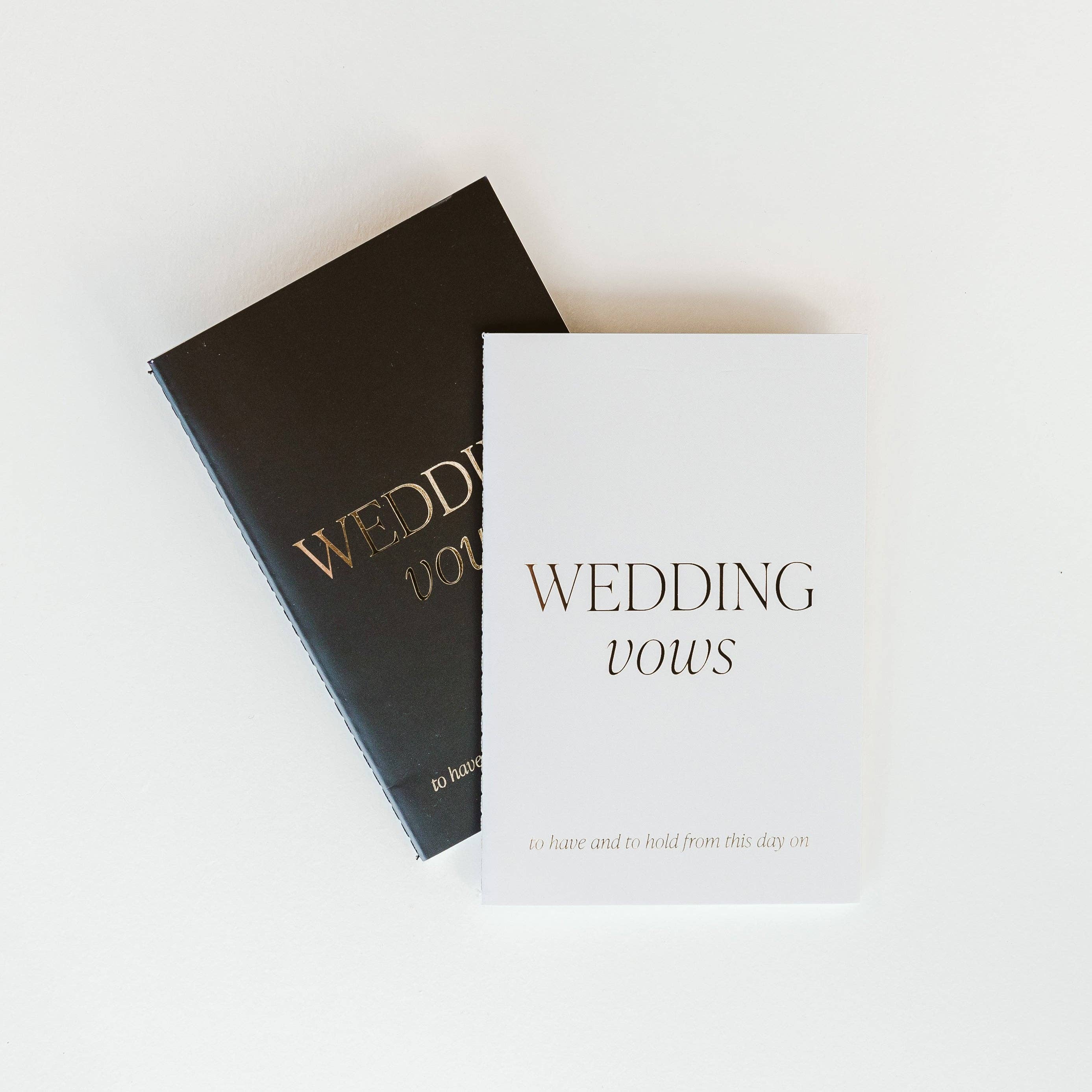 Two books titled 'Wedding Vows' on a light background