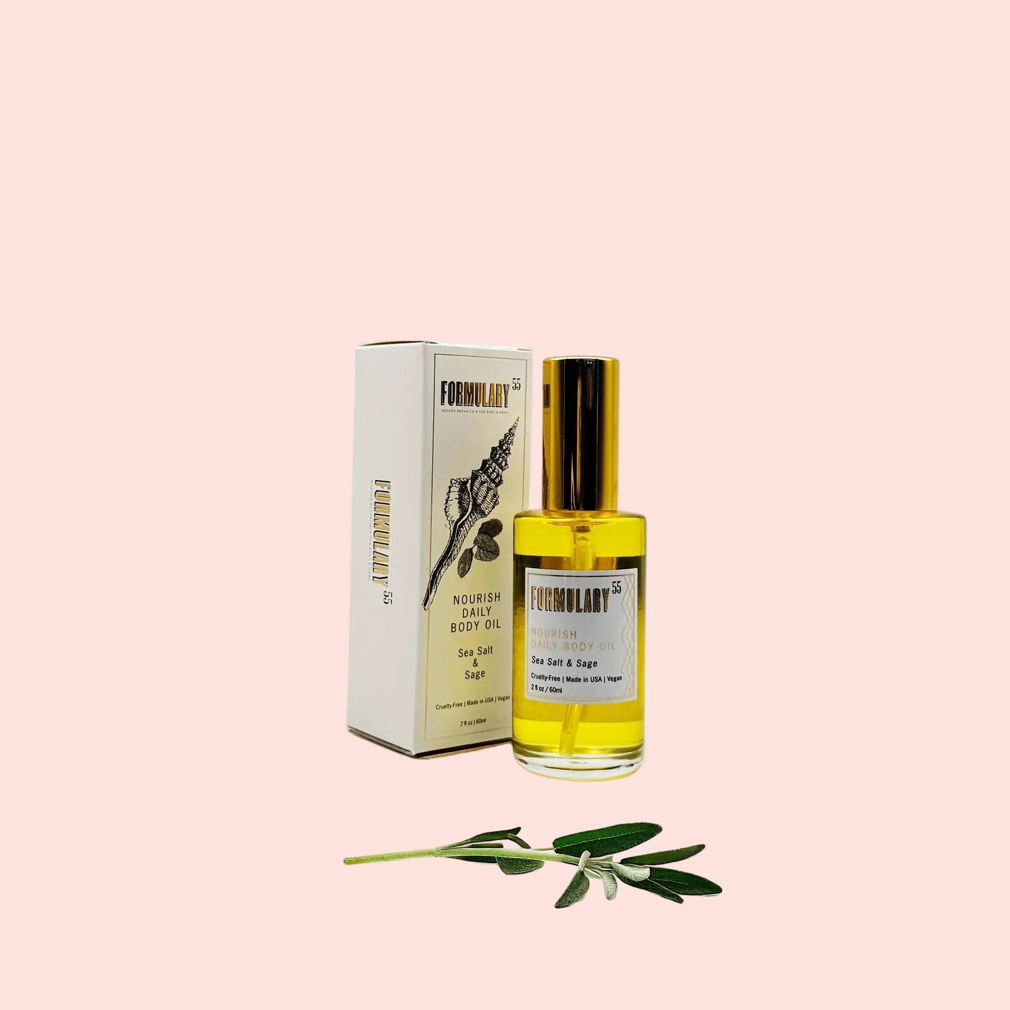 Bottle of body oil with packaging on a white background