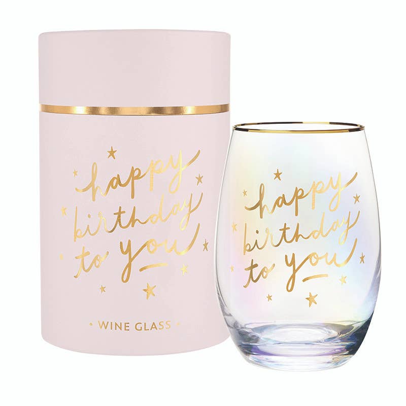 Pink gift box with gold text and clear wine glass with gold text on a white background