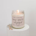 Candle in a jar with 'omg! you're engaged!' text on a white background