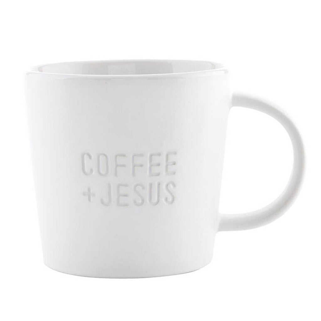 White mug with 'COFFEE + JESUS' text on a white background